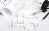 Fototapeta  - Architecture plan and rolls of blueprints