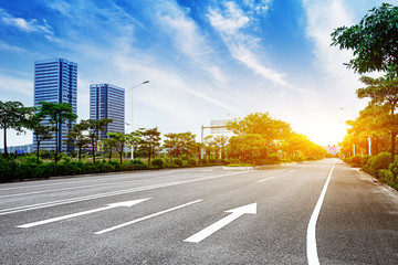 Asphalt road and modern city