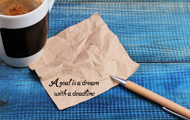 Wall Mural - Inspiration motivation quotation a Goal is a dream with a deadline   and cup of coffee