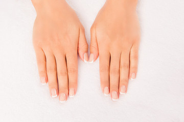 Top view photo of woman's hands with perfect manicure