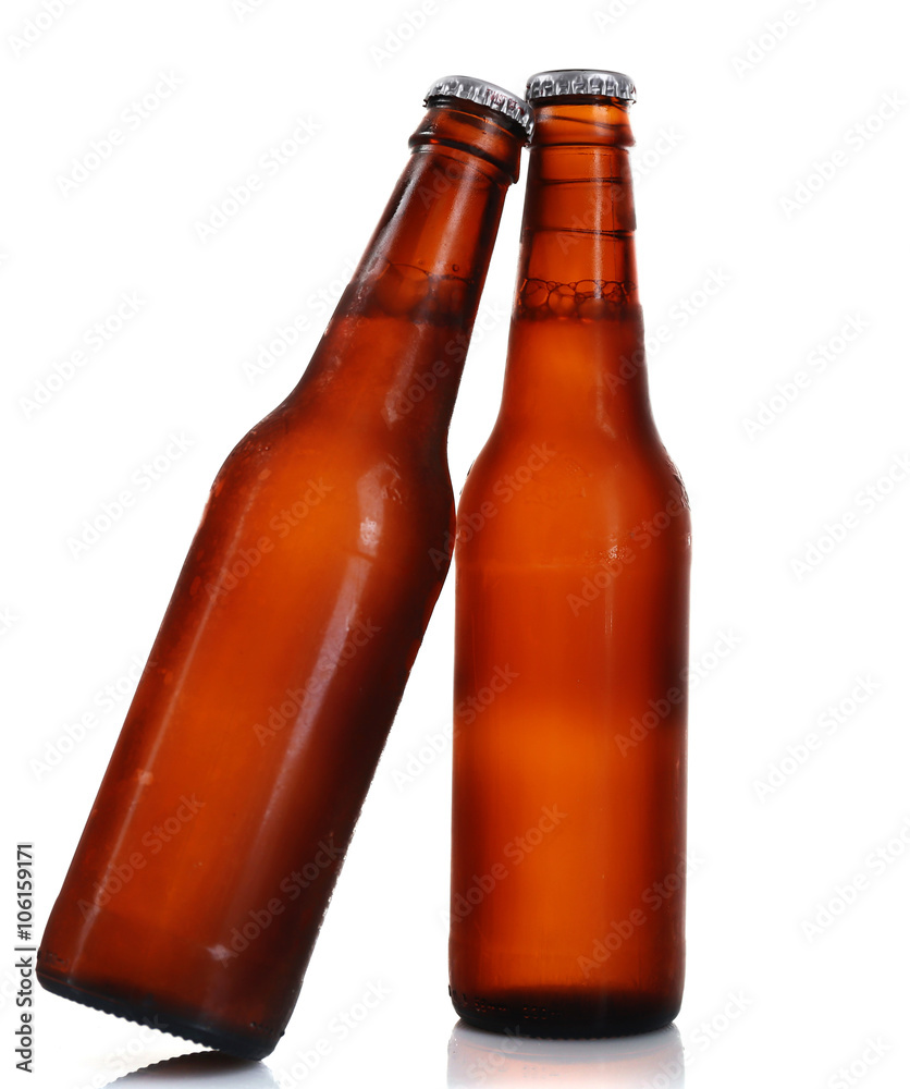 Two brown glass bottles with beer, isolated on white