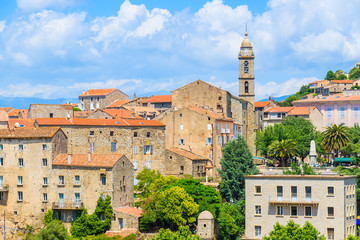 Wall Mural - View of church in Sartene village with stone houses built in traditional Corsican style, France