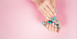 beautiful manicure. gel polish coating in white and turquoise, s
