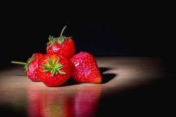 strawberries on wooden..