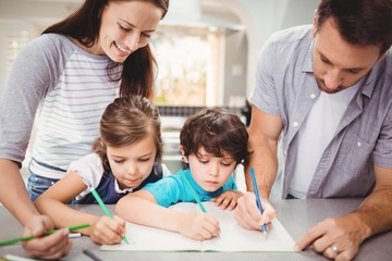 Poster - Family writing in book while standing at table