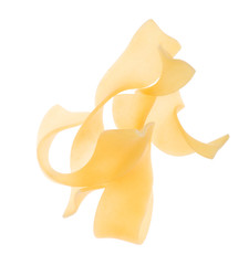 Wall Mural - curled yellow pieces of macaroni on white