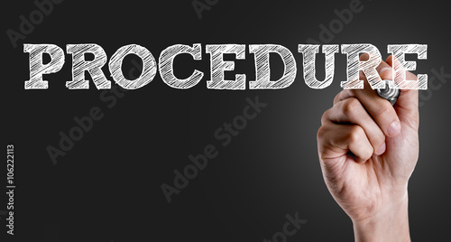 Fényképezés  Hand writing the text: Procedure