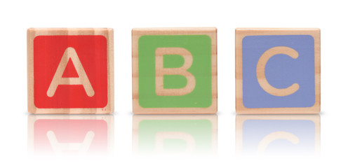 Wooden alphabet blocks isolated on white background