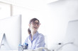 © Monet - Company employee women smile in the office