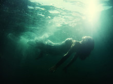 Woman Floats Underwater