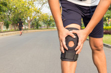  Close Up Of Knee Support Brace On Leg At Public Park