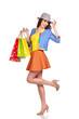 © ZoomTeam - Casual style woman hold shopping bag. Studio female isolated por