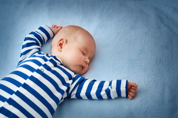 Wall Mural - Baby sleeping in bed