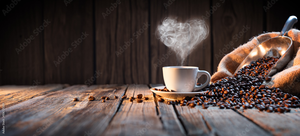 Traditional Coffee Cup With Heart-Shaped Steam On Rustic Wood
 - obrazy, fototapety, plakaty 