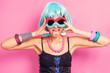 Pop girl wearing weird sunglasses and blue wig