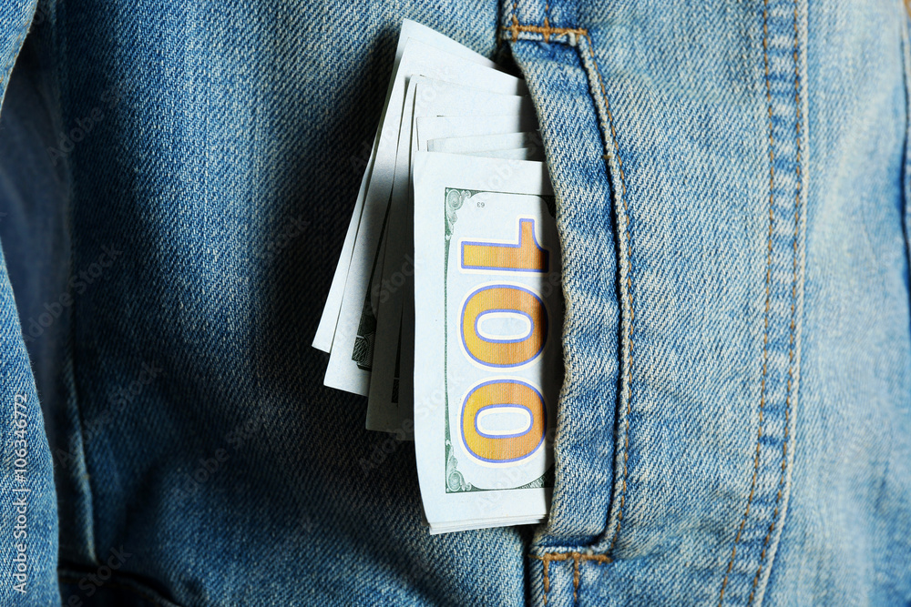 Money in the jeans jacket pocket, close up