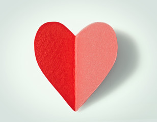 Wall Mural - Red paper heart isolated on white background, close up