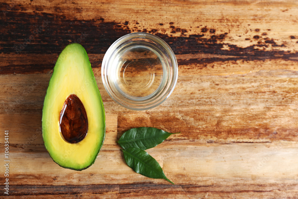 Fresh avocado  on wooden table, top view