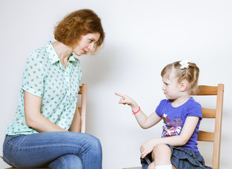conflict between young mother and her little daughter
