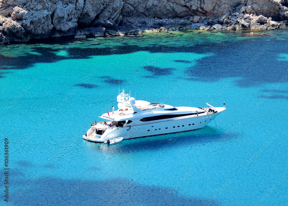 boat anchored in a bay, luxury yacht - obrazy, fototapety, plakaty 