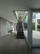 © alexandre zveiger - hall with iron staircase