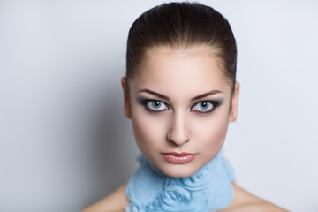 Woman with blue necklace