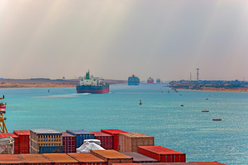 Wall Mural - Industrial container ship passing through Suez Canal with ship's