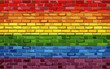 Gay pride flag on a brick wall - Illustration,  
Rainbow flag on brick textured background, 
Flag of gay pride movement painted on brick wall,
Gay and transgender comminity in brick style