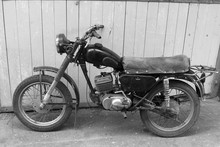 Retro Motorcycle. Black And White Photo. Old Vintage Card.