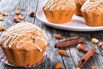 Sticker - Whole Wheat muffins with raisins, nuts and ginger, close-up