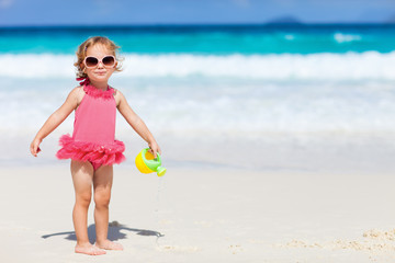 Sticker - Little girl playing at beach