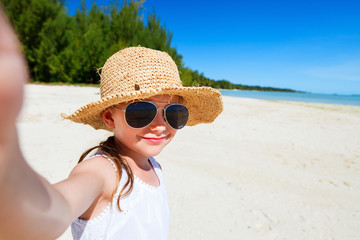 Wall Mural - Adorable little girl at beach