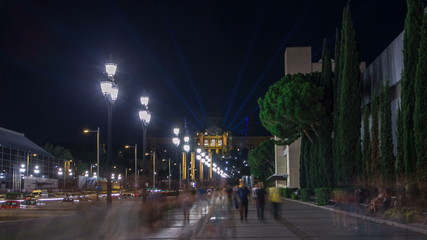 Wall Mural - Way to Magic Fountain light show timelapse hyperlapse at night next to National museum in Barcelona, Spain. 1000 years of art