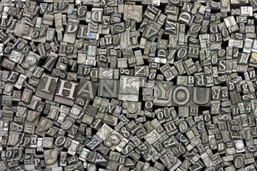 Close up of typeset letters with the words Thank You