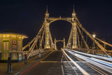 Fototapeta Miasto - Illuminated Albert bridge in west London at night