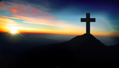 Wall Mural - Christian cross on the hill on sunset