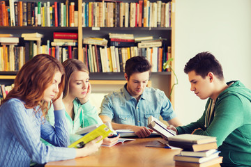 Wall Mural - students with books preparing to exam in library