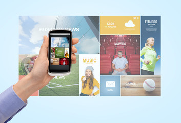 close up of hand with web pages on smartphone