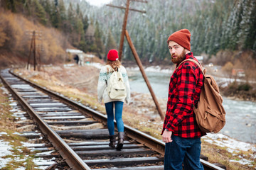 Poster - Beautiful young couple walking outdoors