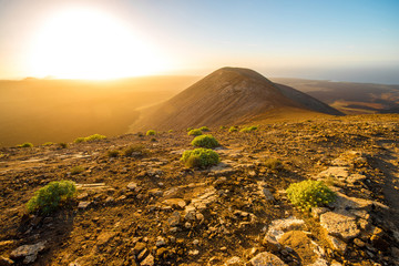 volcanic landscape view from the top of caldera blanca volcano on the sunset on lanzarote island in 