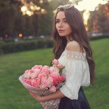 Girl With Pink Roses