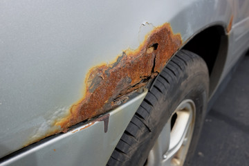 severe rust on a car fender