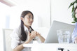 © Monet - Business women have to work with a laptop