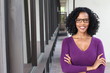 © ajr_images - A pretty African american woman wearing glasses at work