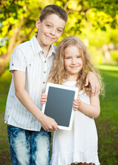 Sticker - Children with tablet pc outdoors