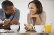 © JGI/Jamie Grill/Blend Images - Happy couple eating cereal