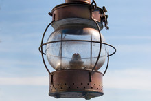 Vintage Marine Lantern With A Wick. Rare External Lamp On The On A Sailboat. Something Old For Inspiration Of Travel. Romance Of The Seas Ship With Sails. Attribute Ancient Mariners And Pirates.