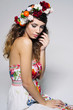 © Zoja - Beauty portrait of a gorgeous woman with gipsy hairstyle wearing handmade fairy flower crown