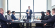 © kasto - Successful team leader and business owner  leading in-house business meeting, explaining business plans to his employees. Business and entrepreneurship concept.