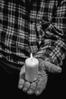 © Tom Pavlasek - Hand and candle